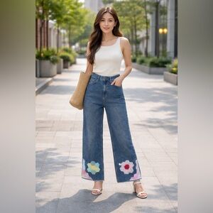 Upcycled wide leg, frayed hem jeans with quilted accents.